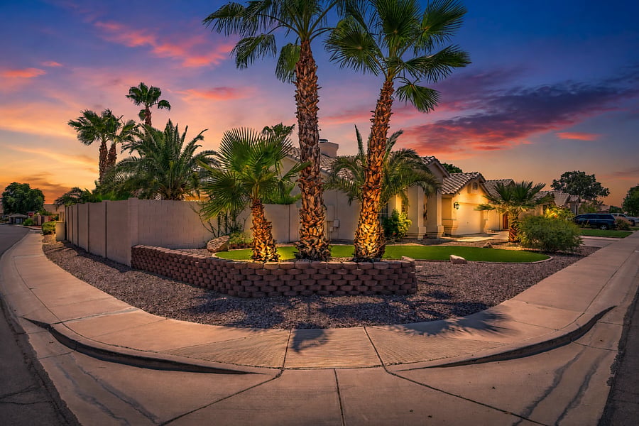 Front Twilight image for property from the corner view, with mailbox on east wall for roommates