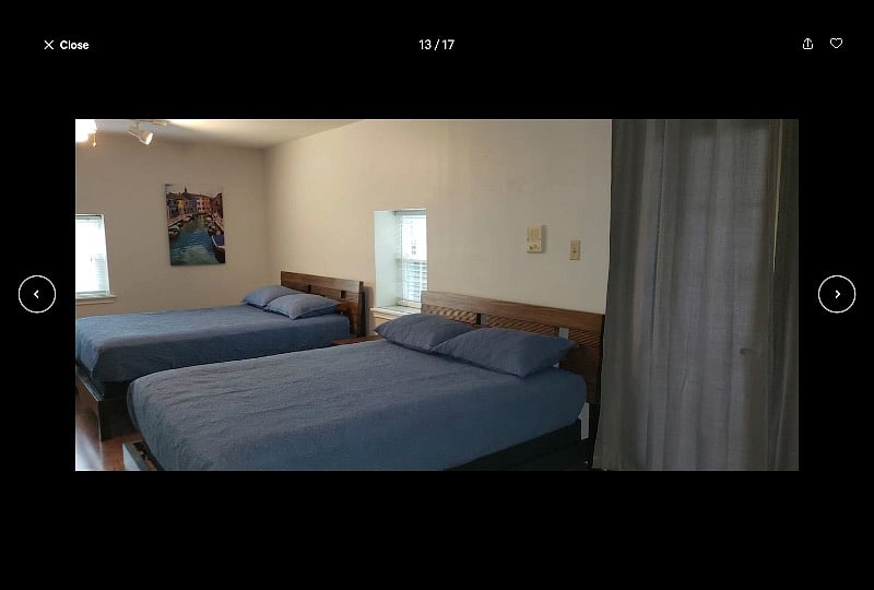 Super large bedroom (upstairs) with two Queen beds (very comfortable mattresses) and large screen TV; adjacent to full bathroom. A partition is available to add privacy between beds. Also, a Queen sofa bed downstairs, for total of three Queen beds!