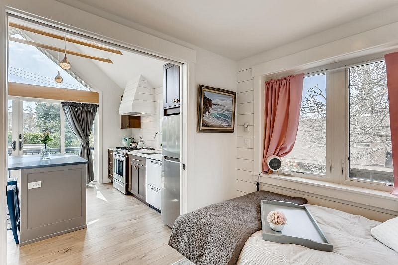 Cozy bedroom with plenty of natural light.