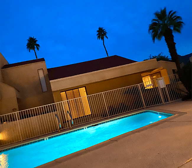 Looking over one of the pools at the actual unit at dusk