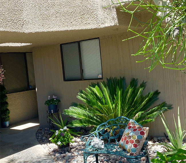 Coming up the walk to your unit, tucked away from privacy...