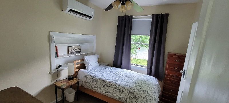 Private green space in back. AC is cold and quiet. Also there are light blocking curtains.