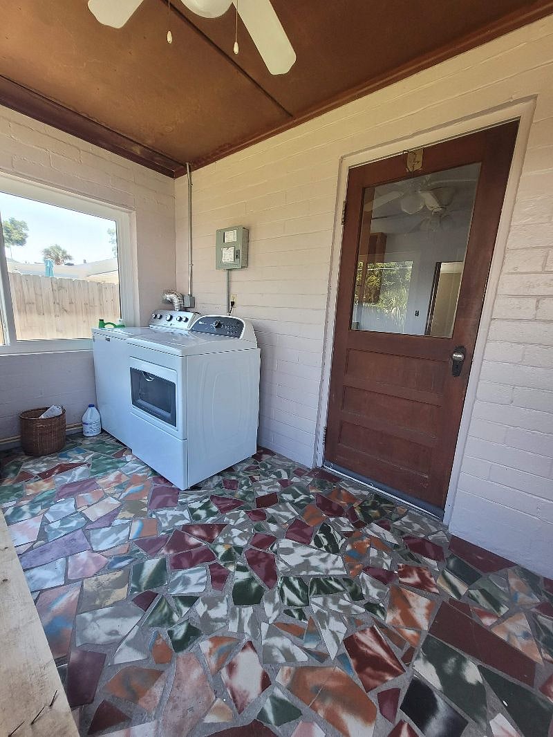 Laundry room on property. Shared by other tenant.