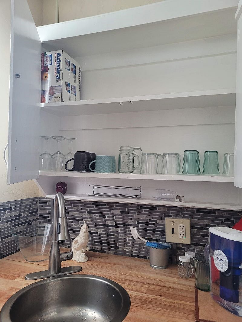 Fully stocked kitchen. Plates, pots and pans, coffee pot, crock pot, flatware, airfryer, etc.
