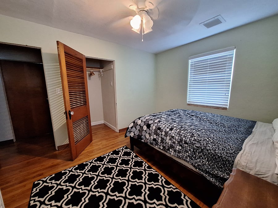 2nd bedroom. Queen-size bed with walk-in closet.
