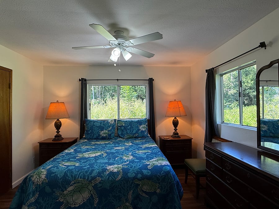 Master bedroom with private 1/2 bath room with new commode, sink faucet, and new vinyl plank floor.