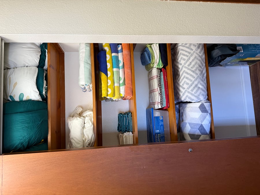 Well stocked linen closet.