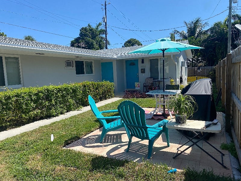Second patio space is shared with the front apartment.