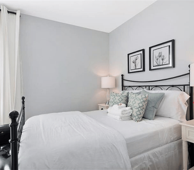 Two nighstands with lamps to make your personal space cozier.