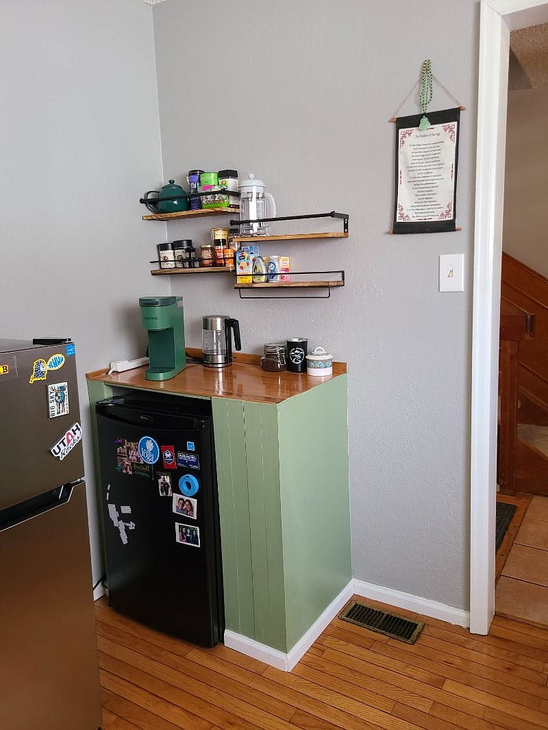 shared condiments fridge and coffee/tea station