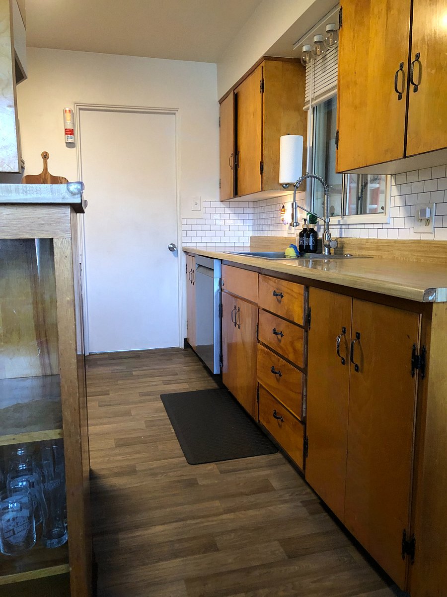 Thoughtfully stocked kitchen with stainless appliances, ample counter space, and everything needed for everyday cooking.