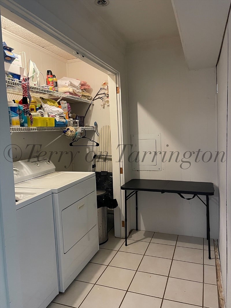 full sized washer/dryer and laundry room stocked with cleaning supplies, etc.