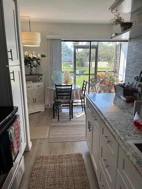 view to lanai and dining from kitchen