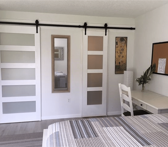 BARN DOORS TO BATH AND WALK-IN CLOSET