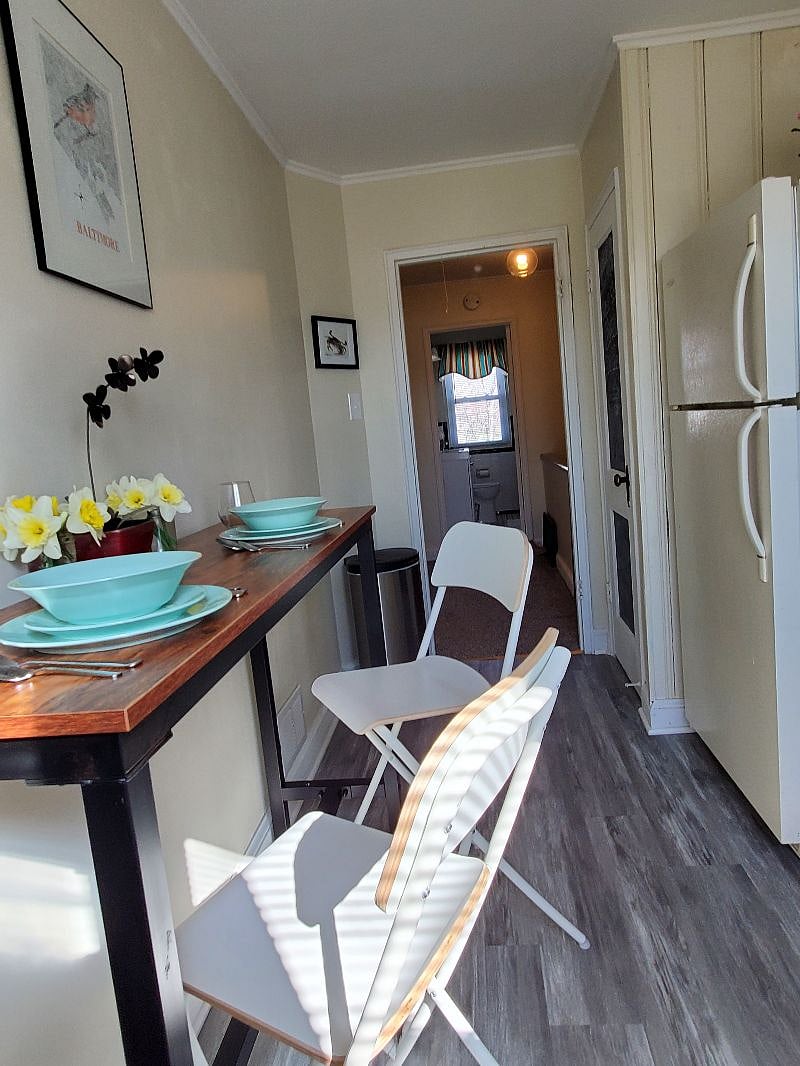 Kitchen has room for 2 people to sit and eat....