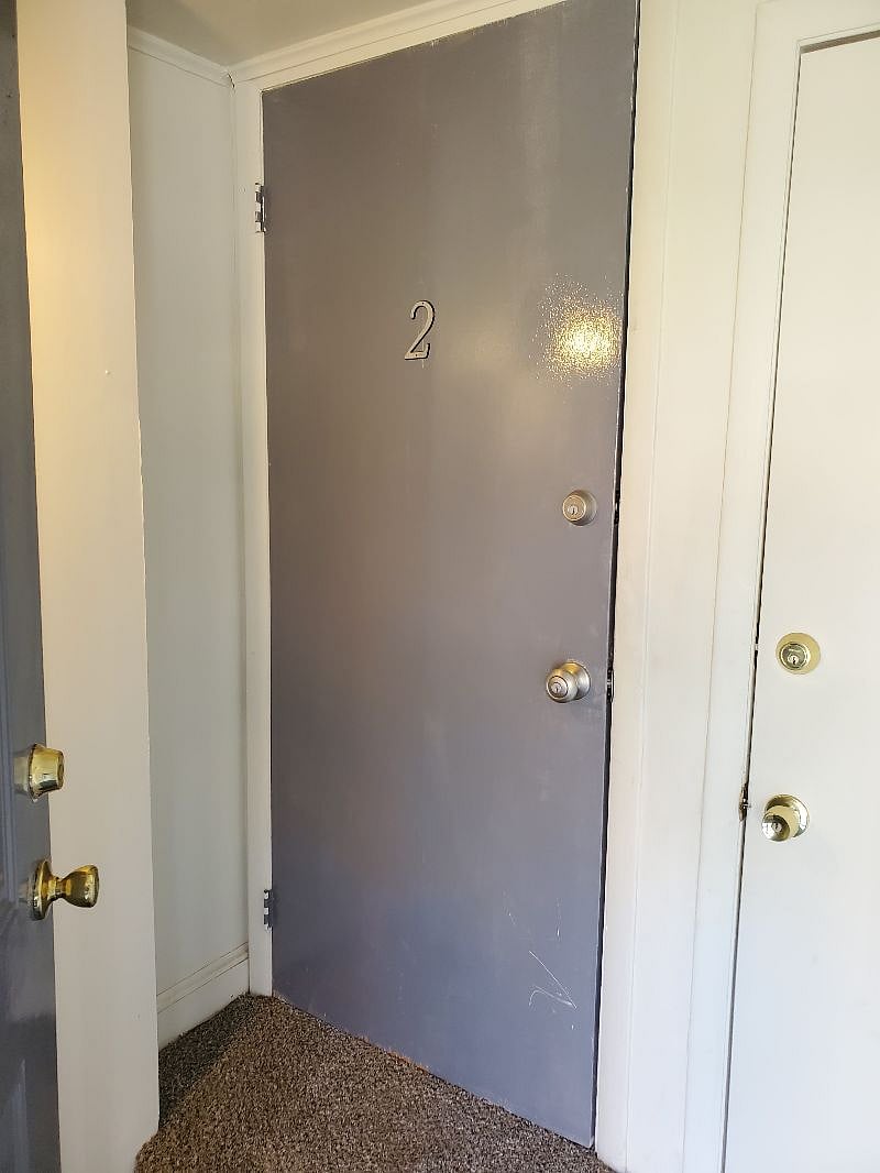 The kocked front door to your apt.
No shared spaces with the other apt. Only the basement laundry room.