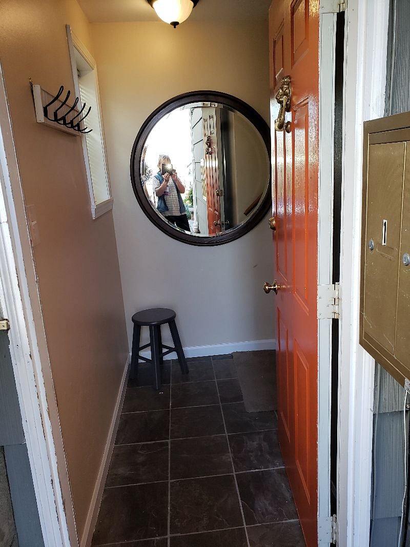 Entrance hallway with stairs to the right.
