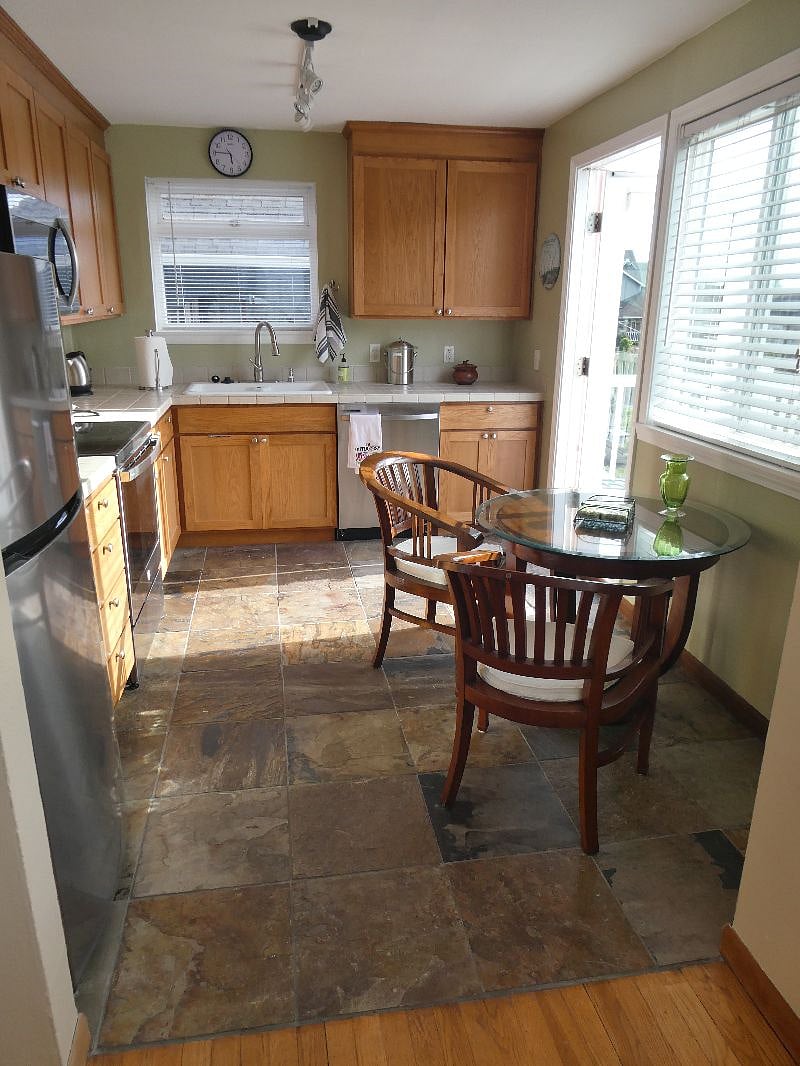 Kitchen showing doorway to deck.