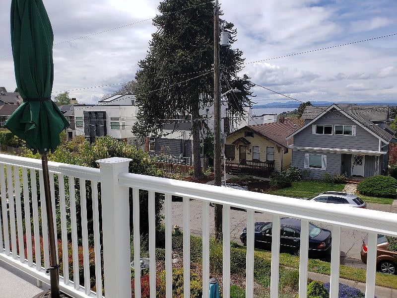 Street view and view of water and mountains.