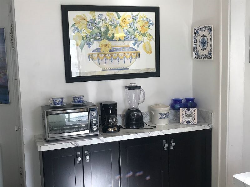 There's a toaster oven, a blender, a hand mixer (not shown), a coffeemaker and even a crockpot (not shown).