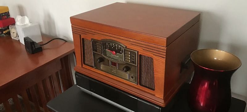 A Crosley combination record player, AM/FM radio, cassette player and CD player offers entertainment options.