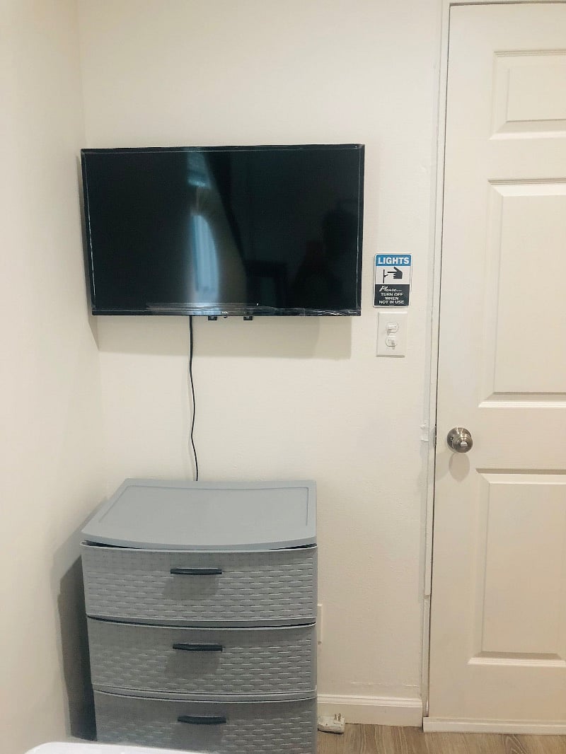 Mounted Smart TV & 5 drawers for clothing etc