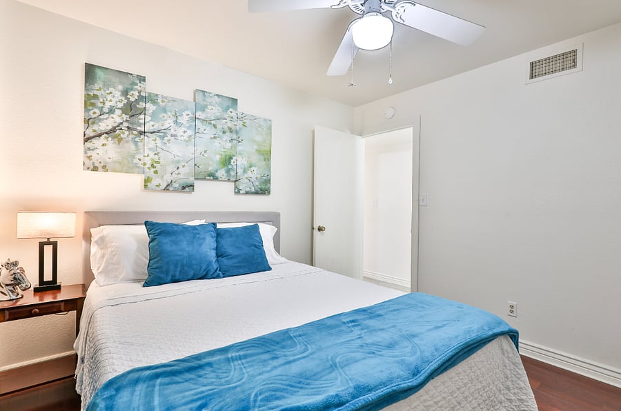 Teal Theme bedroom with a Queen Bed