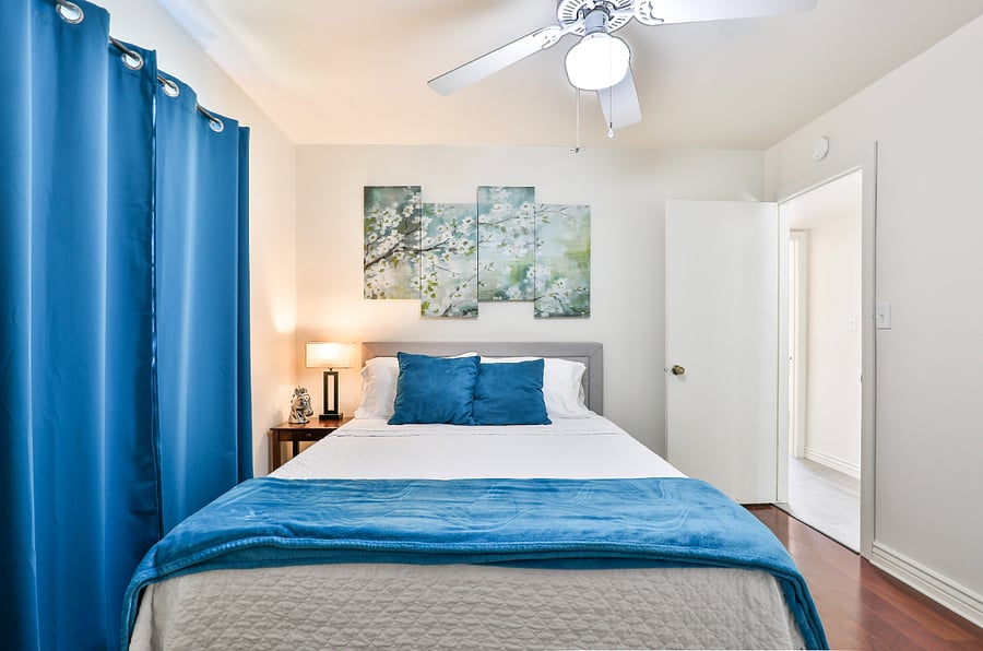 Teal Theme bedroom with a Queen Bed