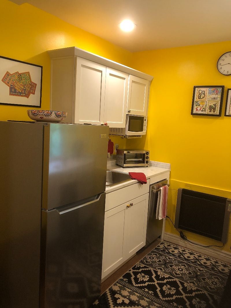 Fridge, dishwasher, toaster oven, cooktop, microwave, pulldown spray faucet and garbage disposal. Dishes, pots and pans, utensils, etc.