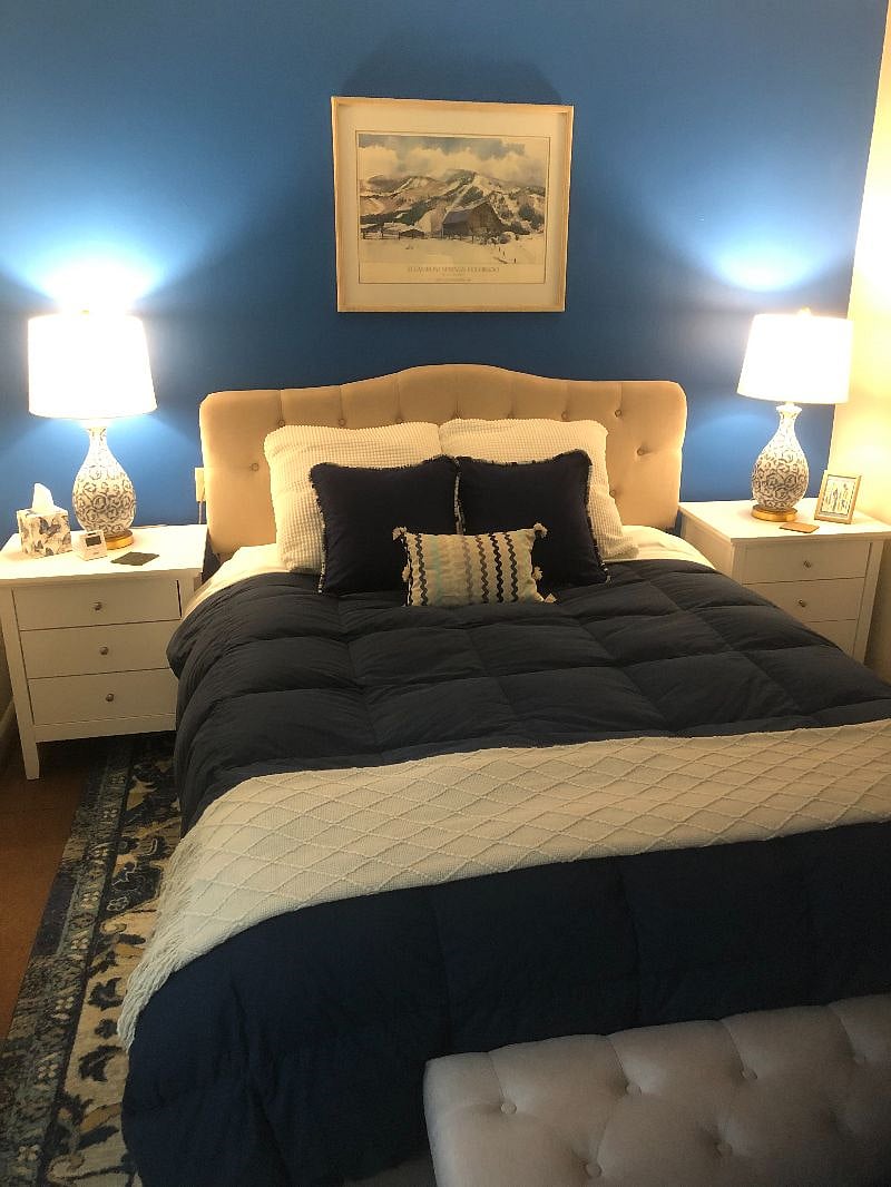 Down comforter; Nightstands w/3 drawers each; 7-drawer dresser in closet & 6 shelves behind door.