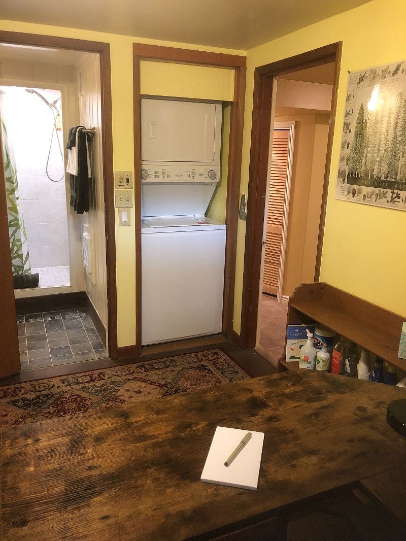 W/D in corner of OFC can handle queen-size comforter; green cleaning supplies; also Clorox Wipes and 3M hospital-grade, 61% alcohol Avagard Hand Sanitizer on lower shelves.