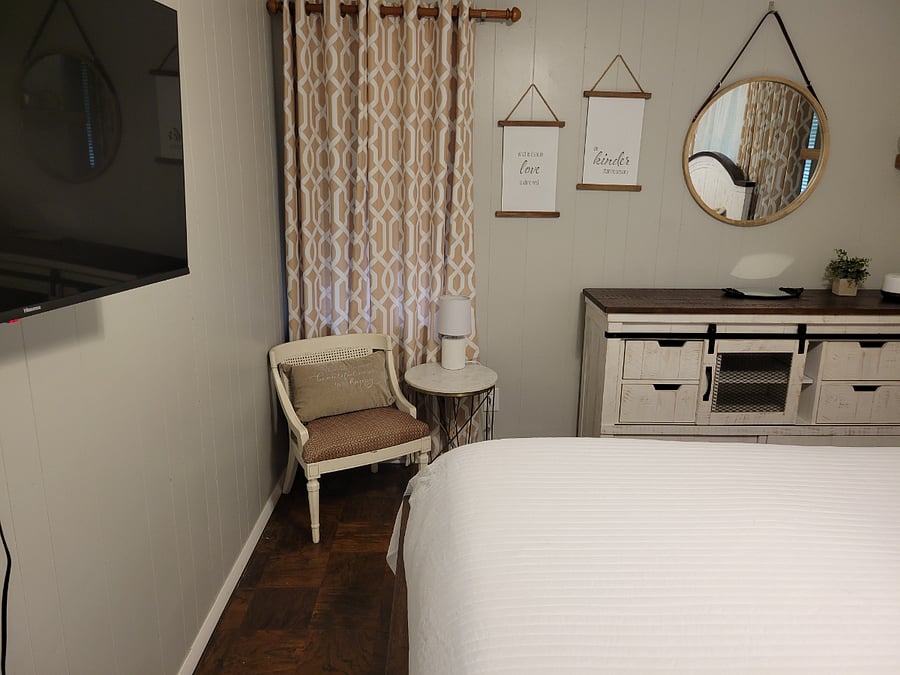 the MASTER Bedroom has area for reading a good book!
