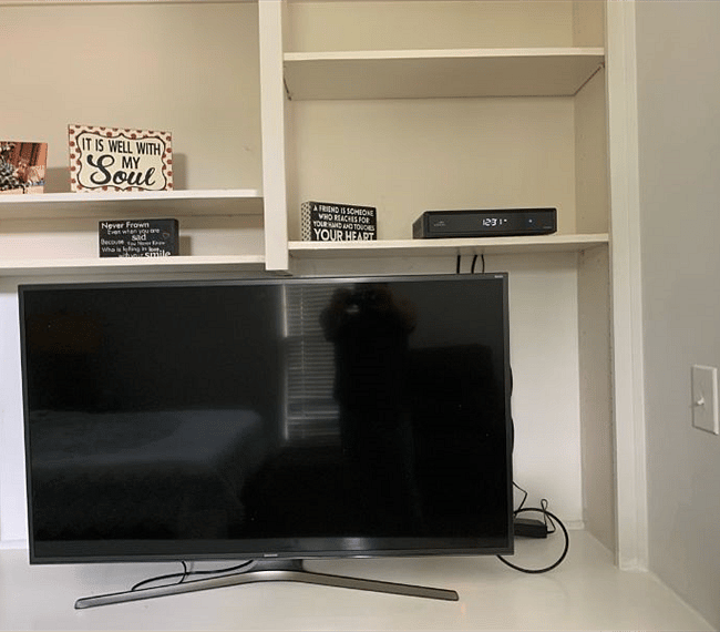 A TV with cable TV and wifi streaming.