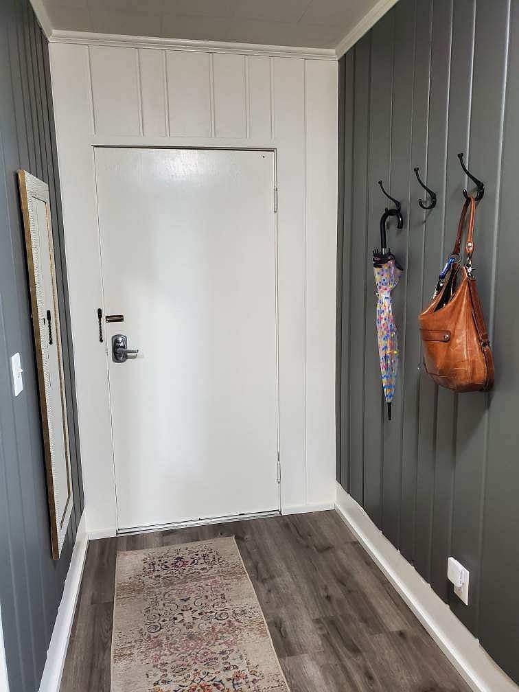 2nd entry door at top of stairwell.