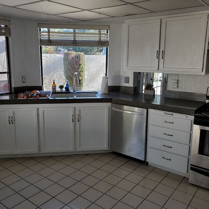Fully appointed kitchen, featuring stainless steel appliances 