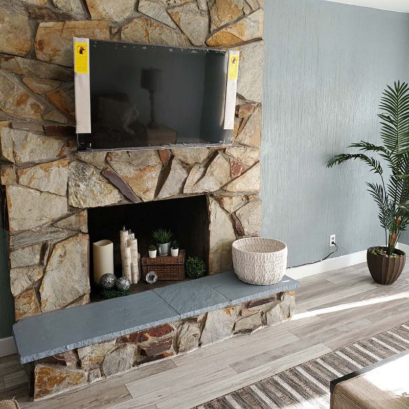 Beautiful Living room with fireplace and flat screen TV