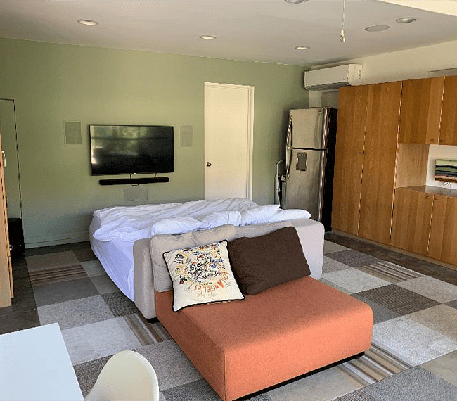 There is a Smart HD Roku TV with soundbar operated by a remote or app on your phone, full refrigerator and freezer, your own HVAC unit which is above the fridge (operated by remote or an app on your phone).When the bed is a queen bed set up, the modular ottoman becomes a small couch.