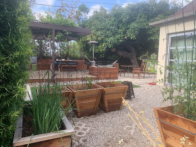 A short walk through a veg garden to your studio and use of backyard deck and patio area is included.
