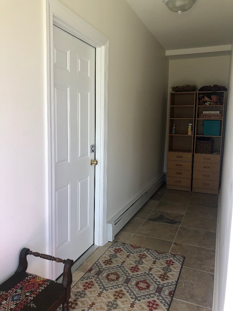 Front hallway with entrance to apartment. All doors have keypads
