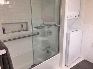 Shower and washer/dryer unit