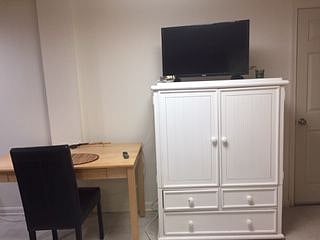 Desk and clothing storage, in addition to a very large closet nearby.