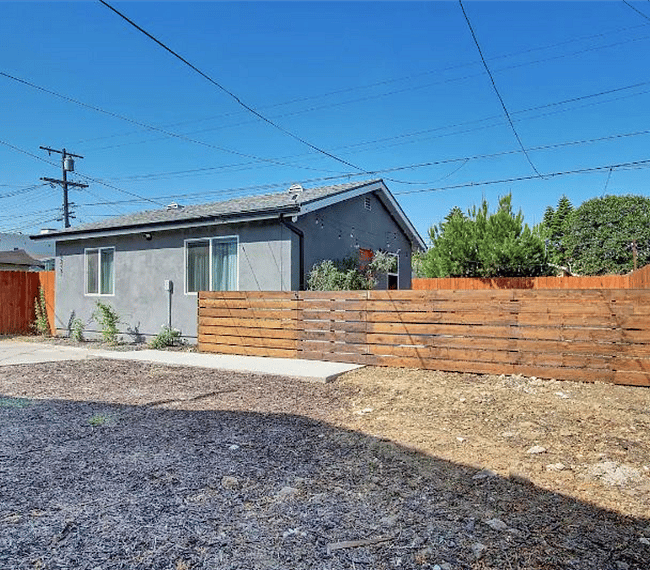 Your home is totally private - the white structure on the far right is only used for storage.