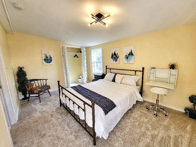Main bedroom with direct access to the carport