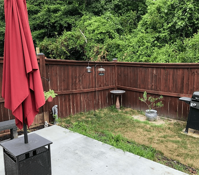 Fenced backyard, includes use of grill. 