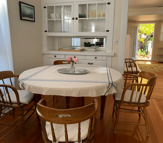 Round dining table that can seat six guests.