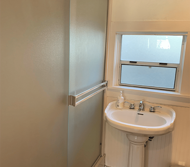 A spacious walk-in shower in the second bathroom.