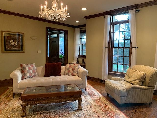 Living room with comfortable seating and lots of natural light