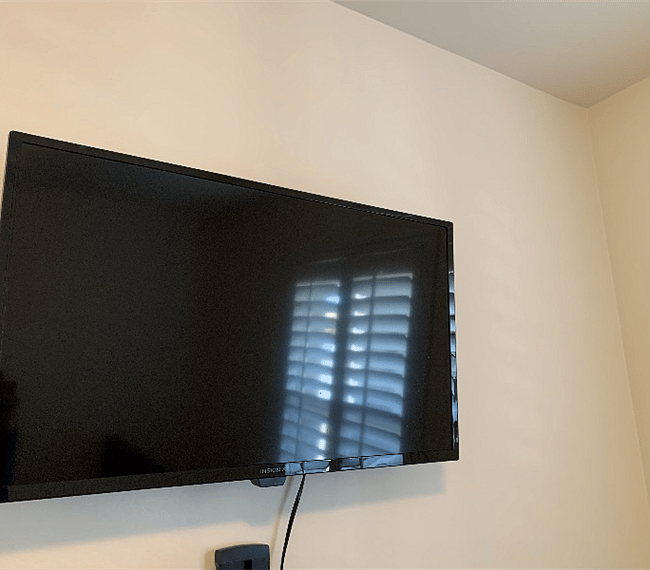 Bedroom 3 includes a smart TV.