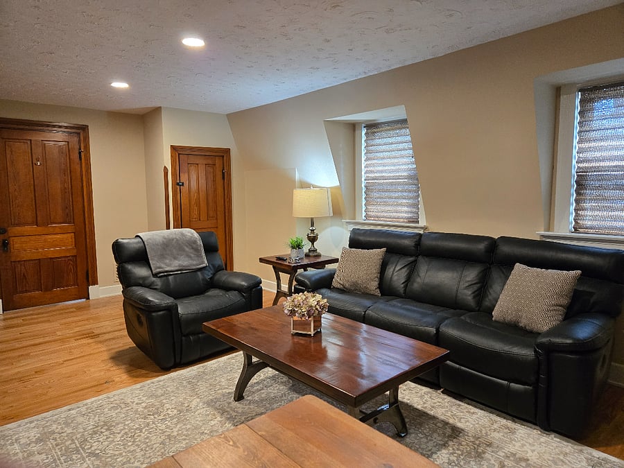 Living Area is to your right as you walk into the apartment