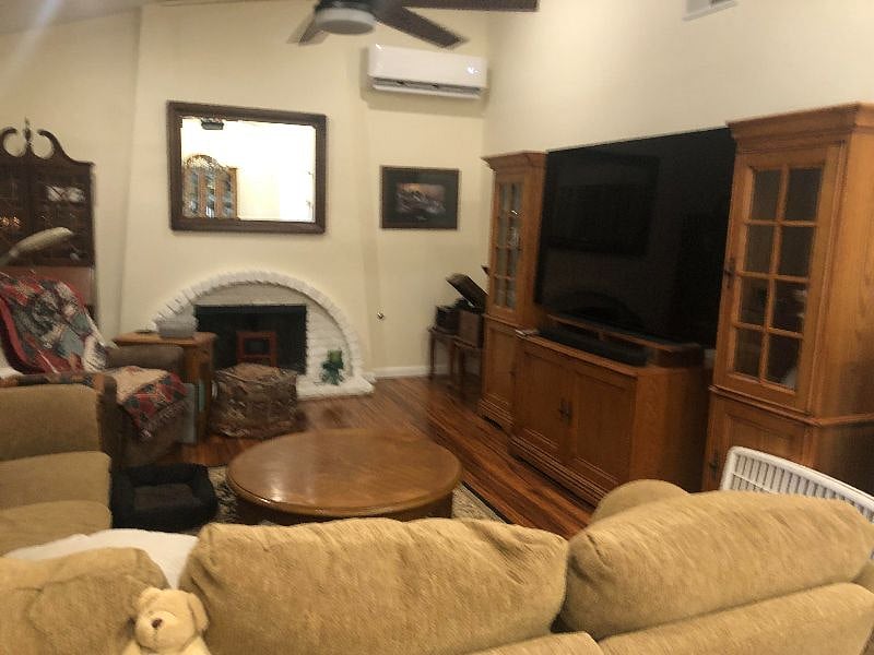 Living room with ceiling fan/light